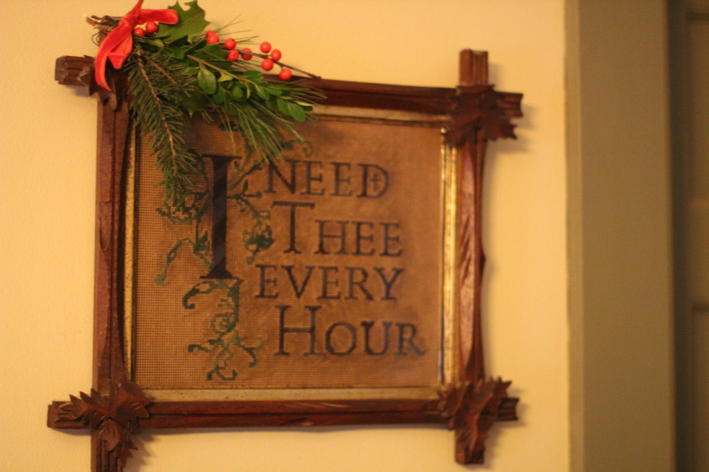 Motto sampler in old Adirondack style frame.